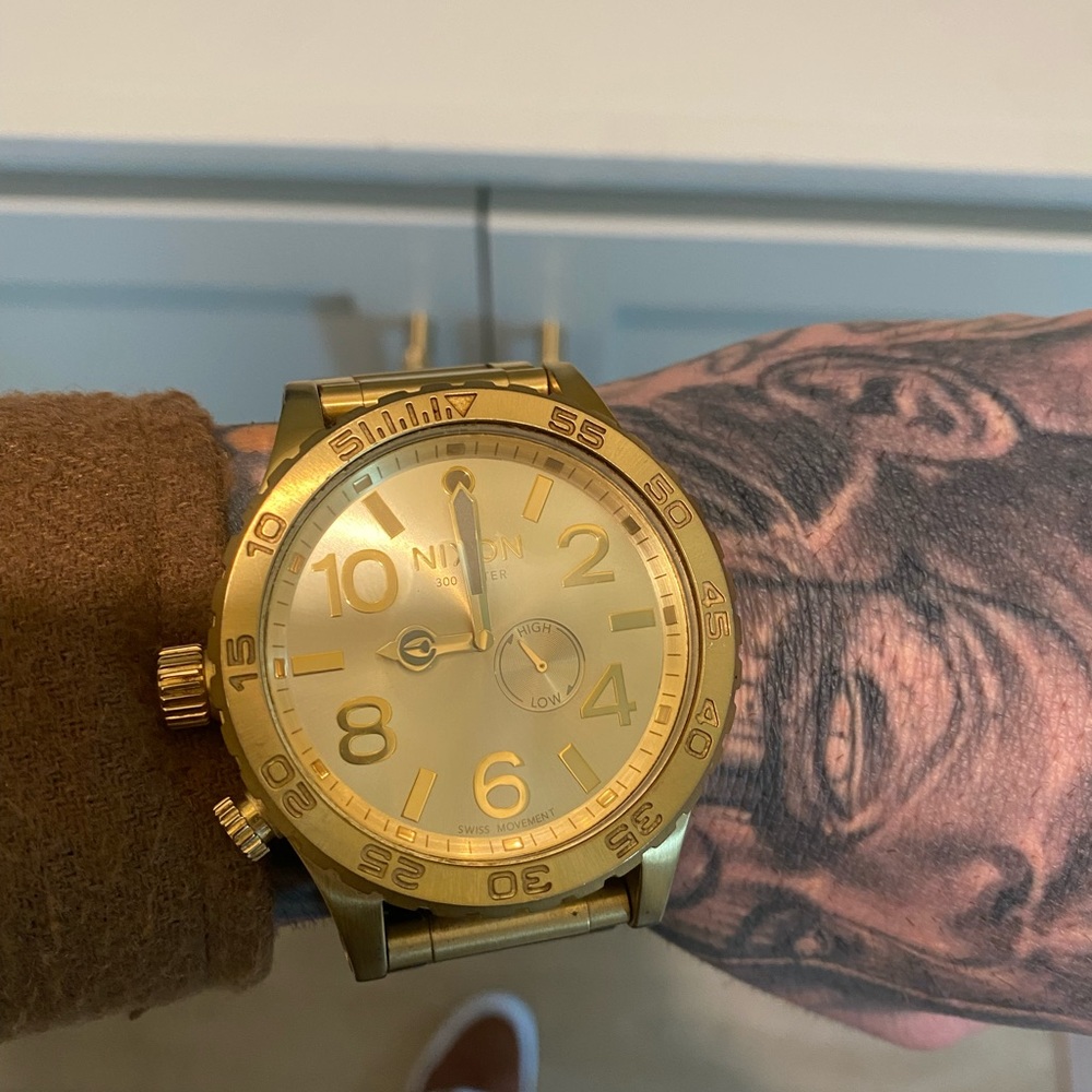 Nixon 51-30 gold watch